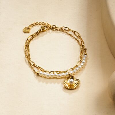 Pulsera de oro de doble cadena con perlas blancas y conchas