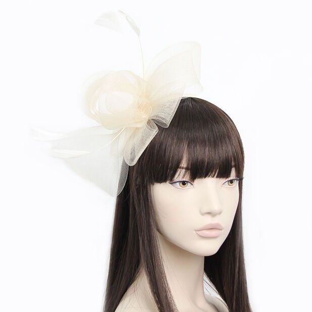 Stile Jackie.Fascinator a rete ad anello su un cerchietto