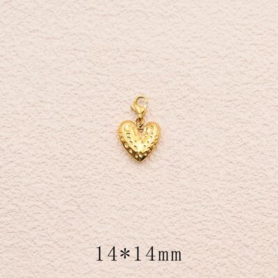 Charm - corazón con pequeños puntos grabados
