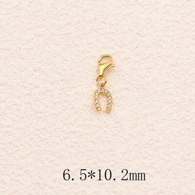 Charm - fer à cheval et oxydes de zirconium