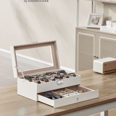 Estuche para relojes con 12 compartimentos y tapa de cristal. Tapa de PU en color blanco nube, forro interior en beige capuchino.