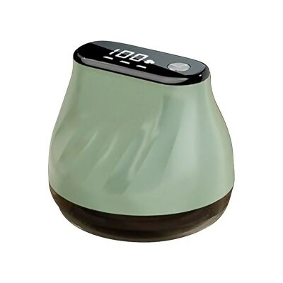 Rimuovi-pelucchi portatile, dal design ergonomico e compatto. Ha uno schermo LCD e tre livelli di potenza. Colore: verde chiaro