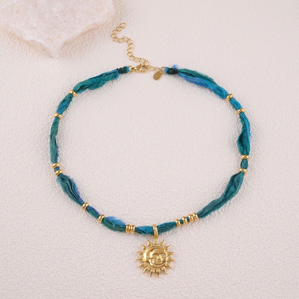 Stoffkette - lächelnde Sonnenmuster und Quaste