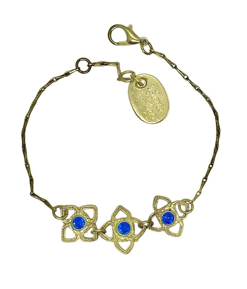 Bracelet Mismy en or avec trois fleurs et cristal bleu SW