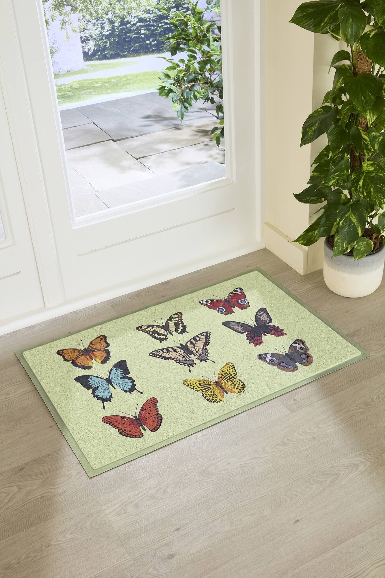 Limettenfarbene Fußmatte mit Schmetterlingen für drinnen und draußen (90 x 60 cm)