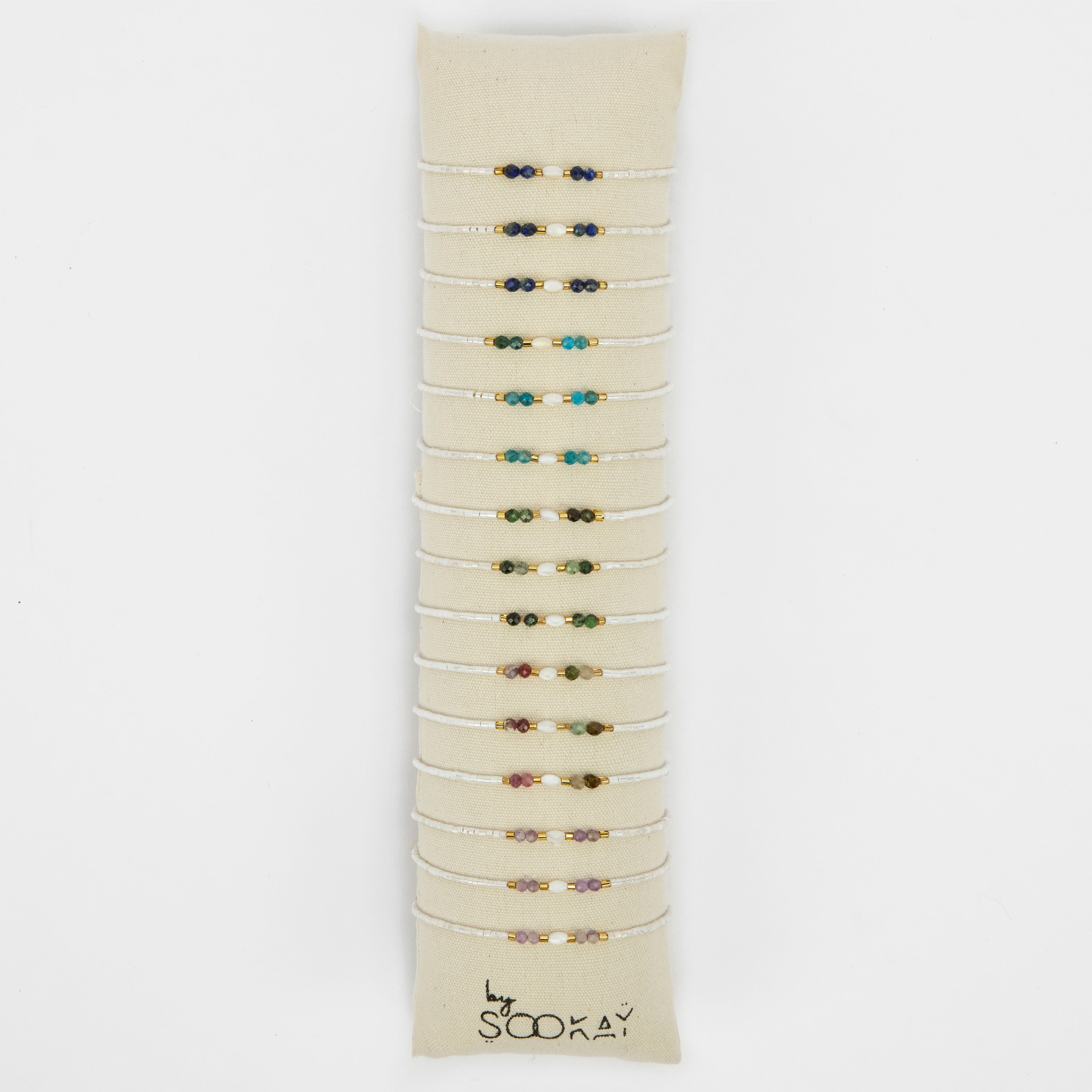 Bracciale in madreperla di semi di riso genuini, pietre naturali sfaccettate e luminose perle giapponesi bianche