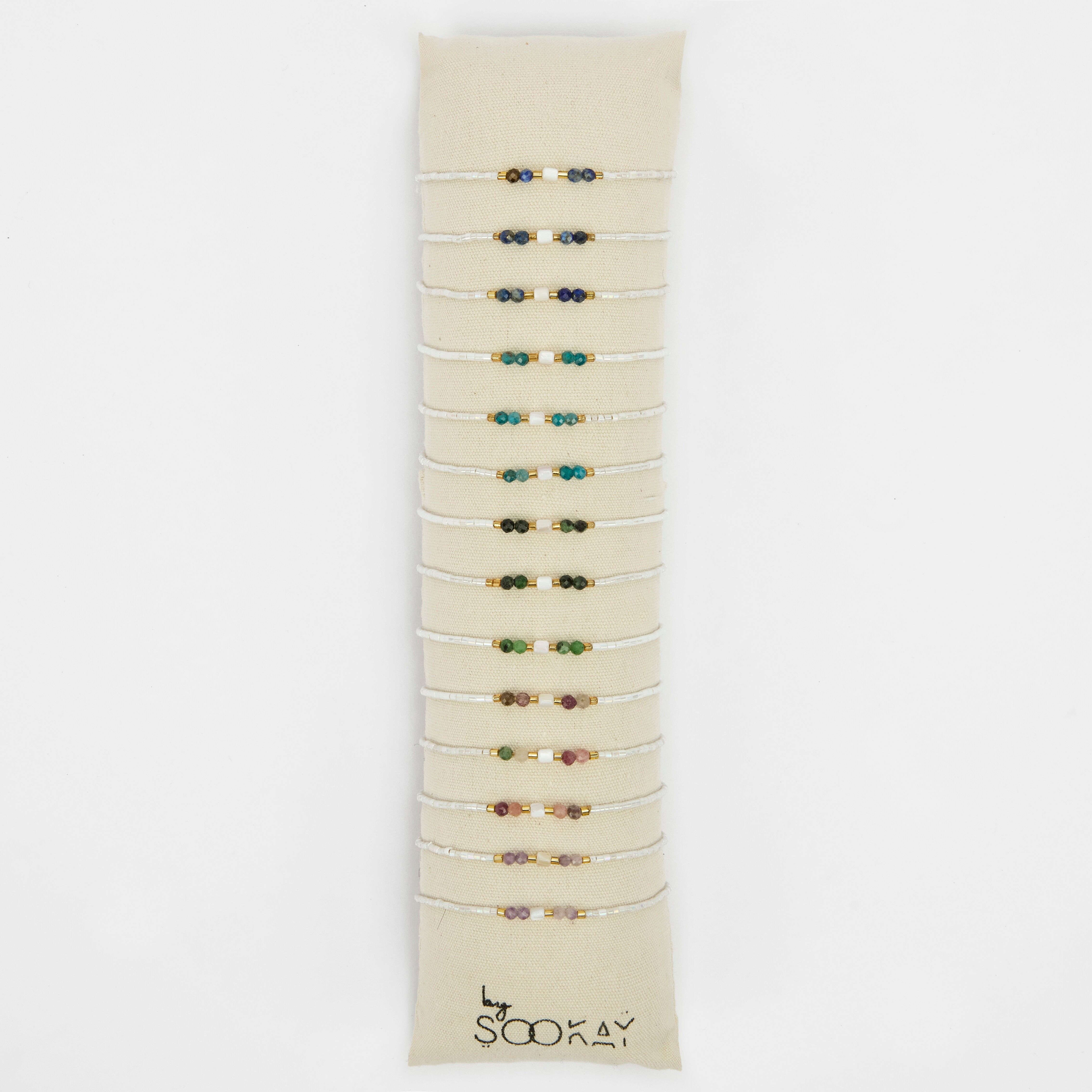 Bracciale in madreperla heishi autentica, pietre naturali sfaccettate e luminose perle bianche giapponesi