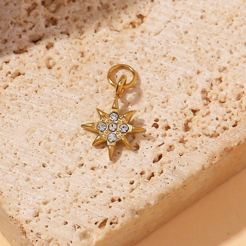 Set di 3 ciondoli a forma di stella con strass