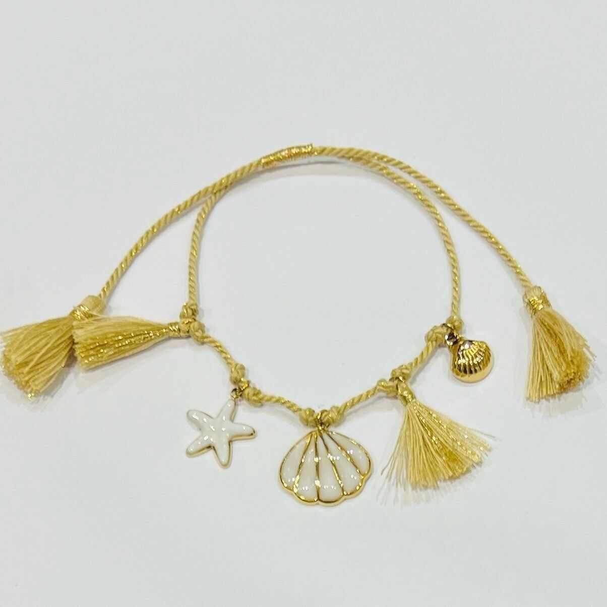 Bracciale in acciaio inossidabile con nappe e ciondoli a forma di delfino marino