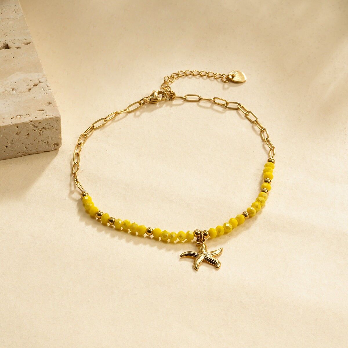 Cavigliera con pietra gialla e stella marina