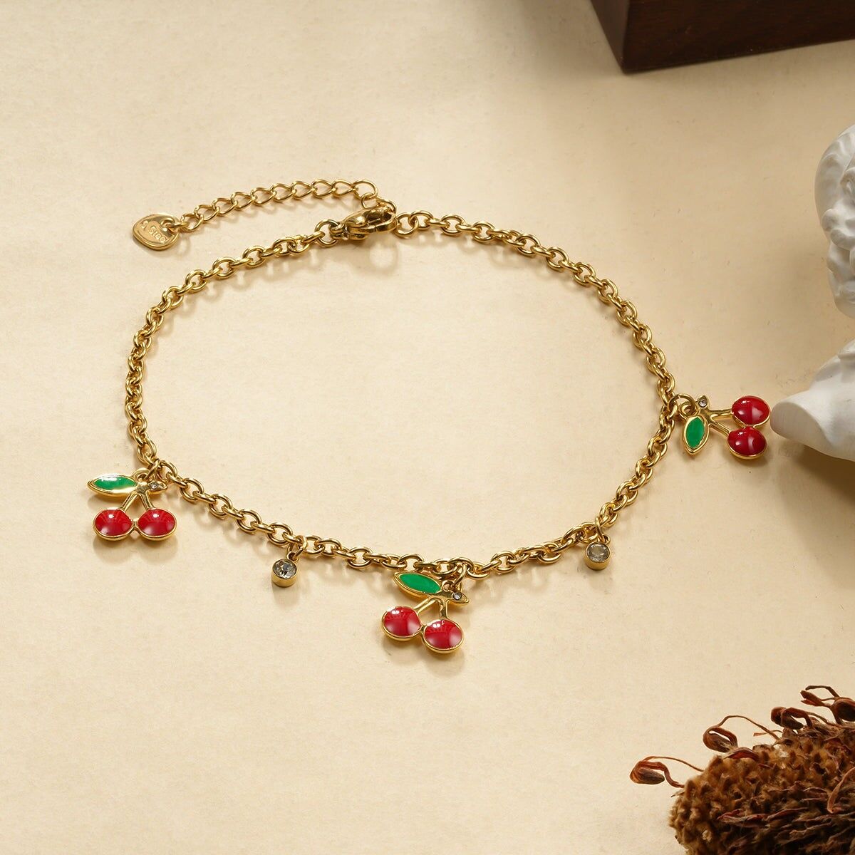 Cavigliera con tripla ciliegia e strass