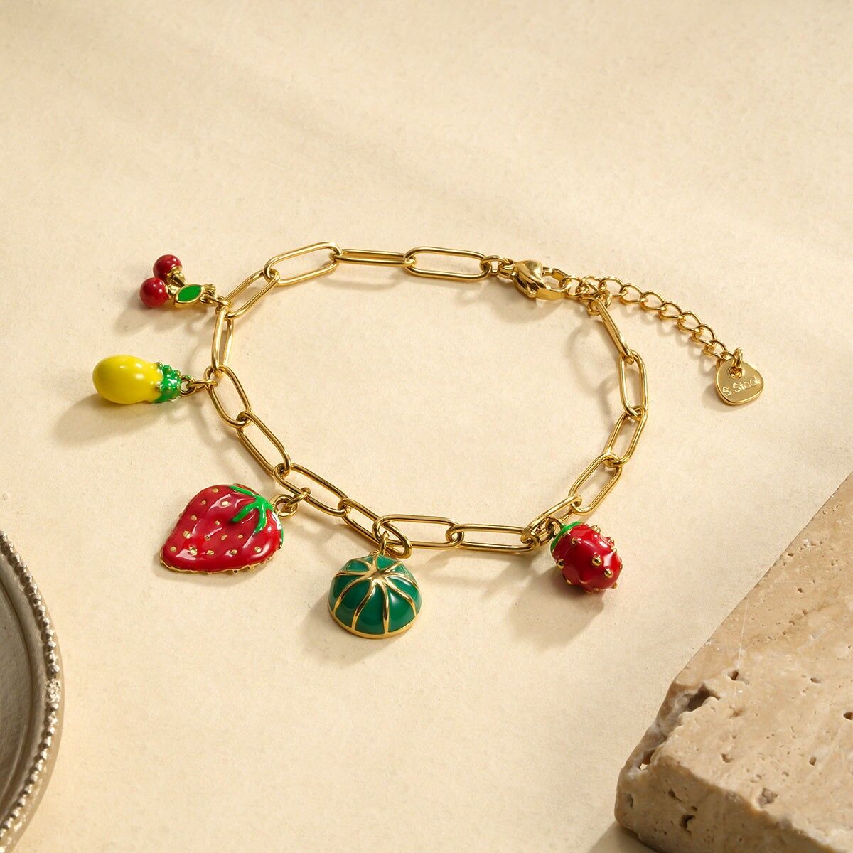 Bracciale a catena in oro con ciondoli fruttati