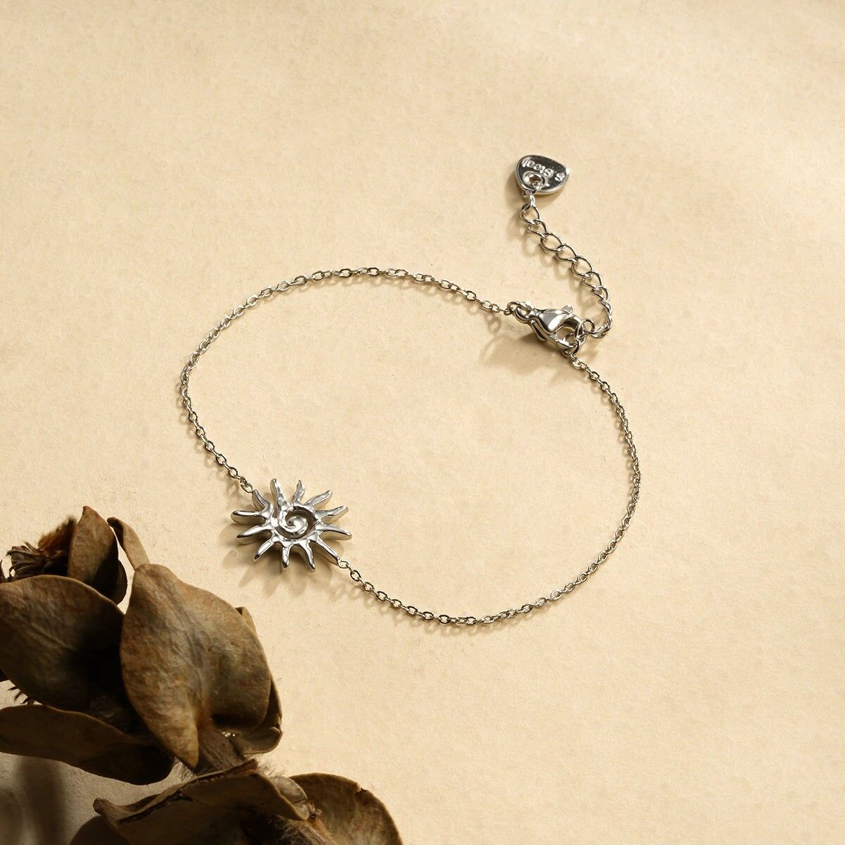 Bracciale a catena a spirale in argento con sole