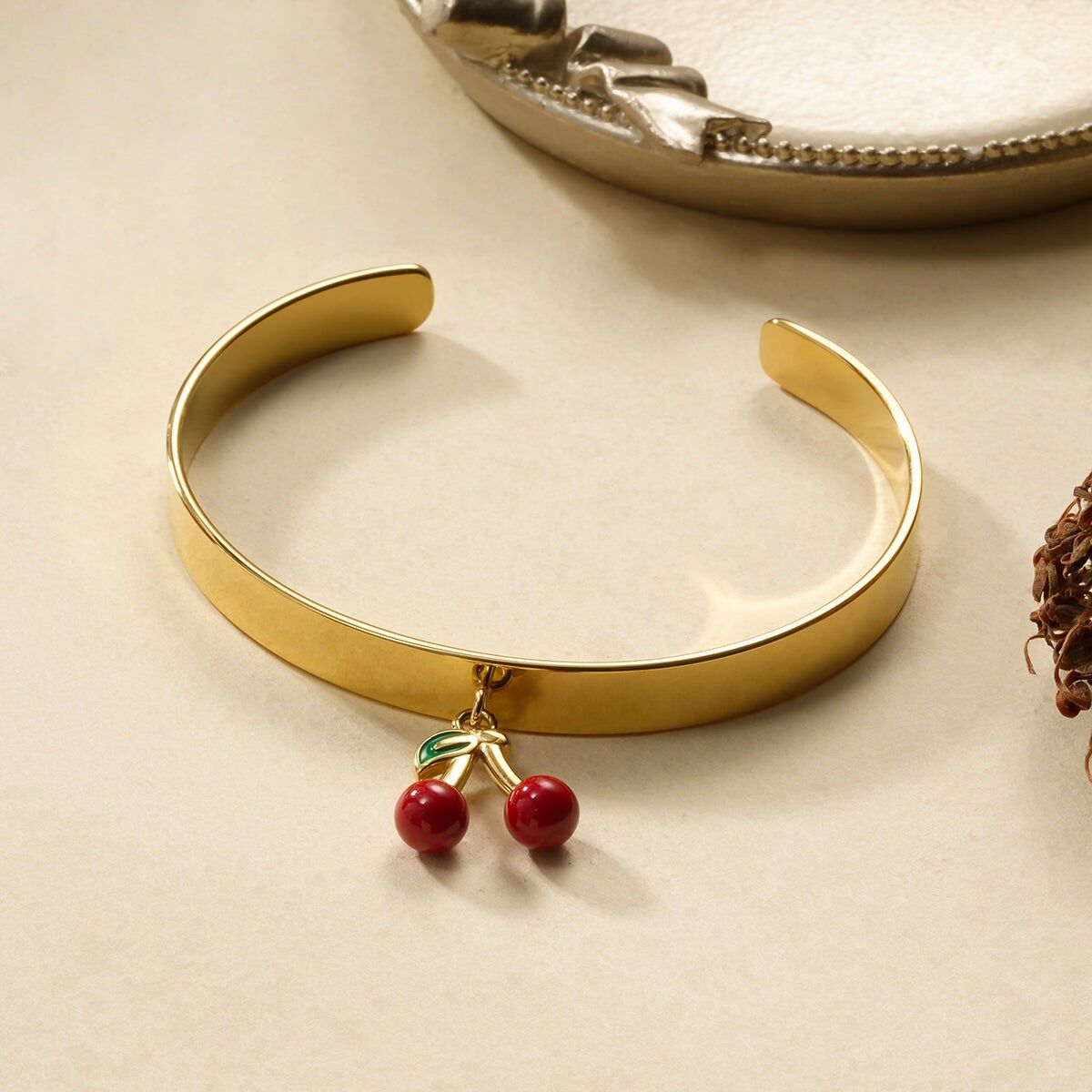 Bracciale regolabile con ciondolo a forma di ciliegia