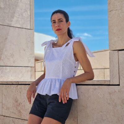 El top peplum de Sevilla en blanco