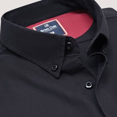 Chemise décontractée noire à manches longues et boutons
