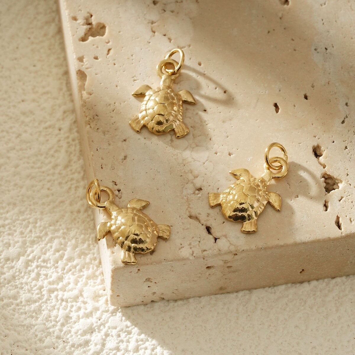 Set di 3 ciondoli tartaruga dorata