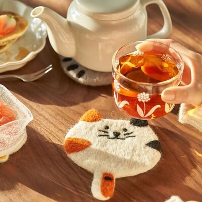 Handmade felt coasters with animal motifs