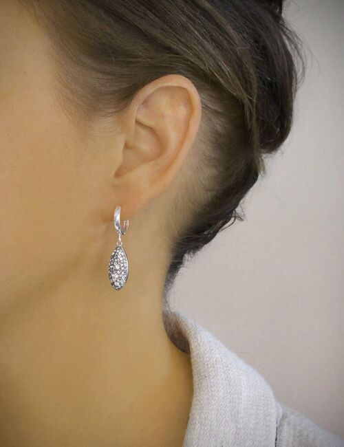 Silver hoop earrings with grey crystal pavé drops
