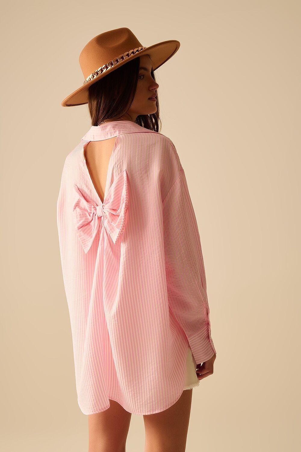 camicia rosa baby oversize con fiocco sul retro