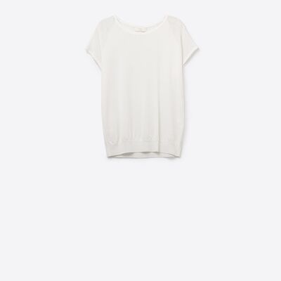 Pull blanc à manches courtes avec maille tricotée sur l'épaule