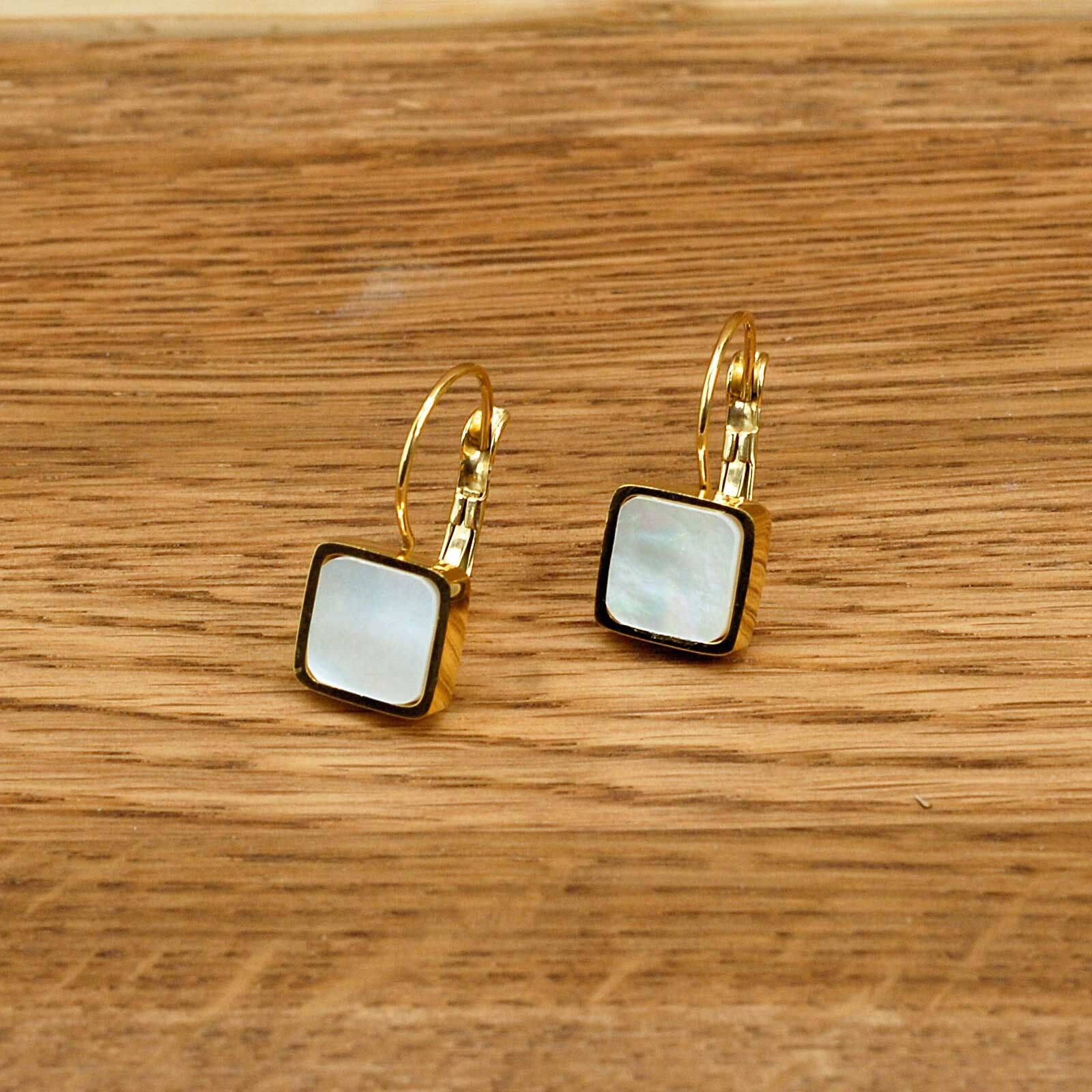 Gioielli in acciaio inossidabile e madreperla