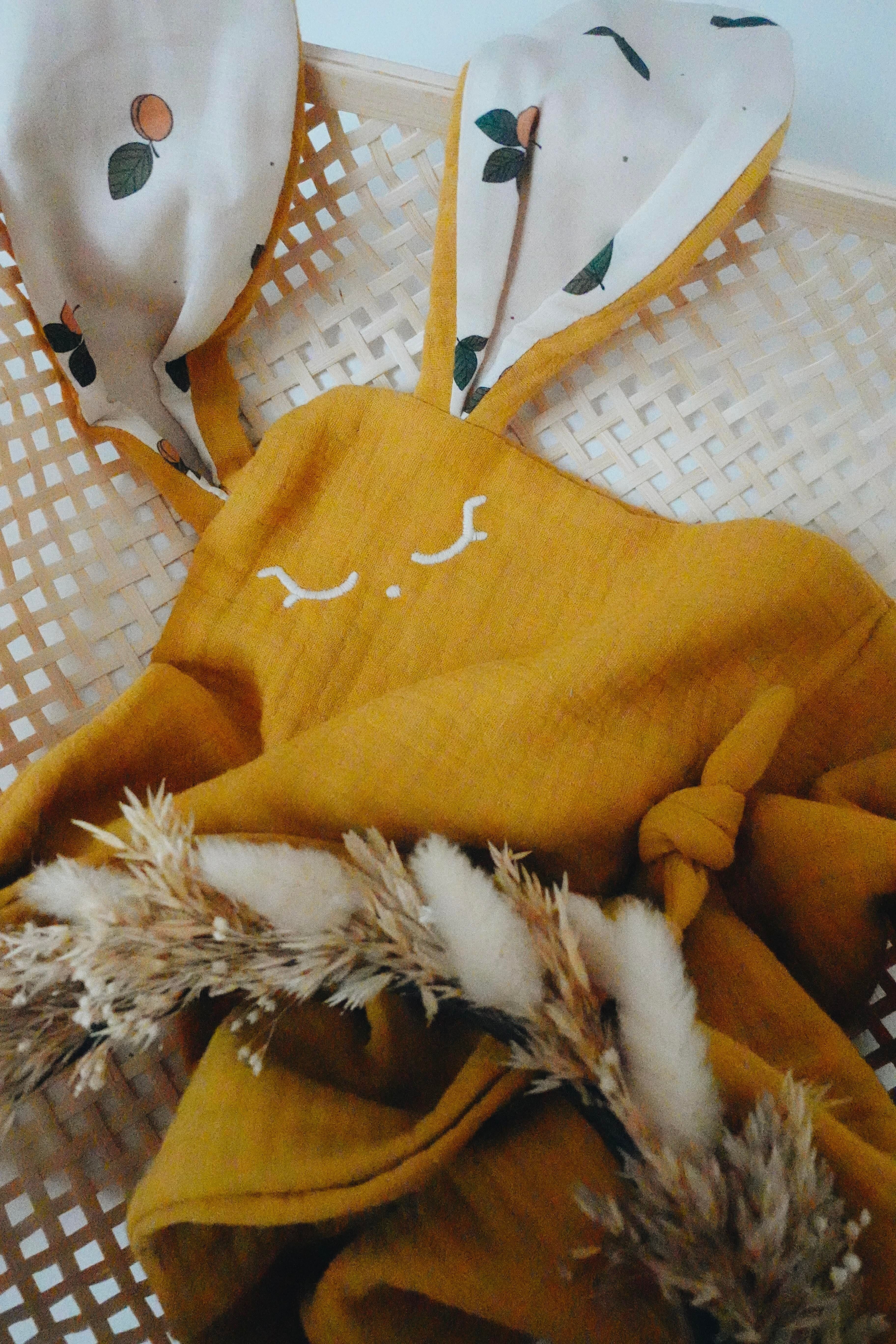 Doudou Lange Cocooning Noeuds - Crème d'Abricots