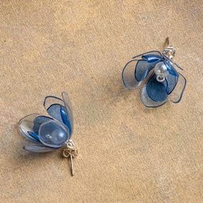 Alfileres de oreja de flores dobles azules y transparentes