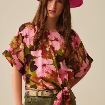 Top con nudo floral y fondo verde en tejido satinado