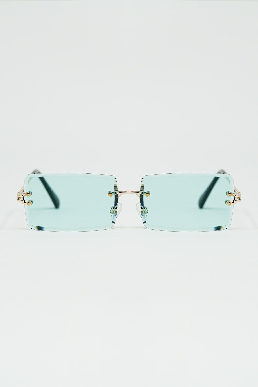 Schmale, randlose, quadratische Sonnenbrille in Gold mit türkisfarbenen Gläsern