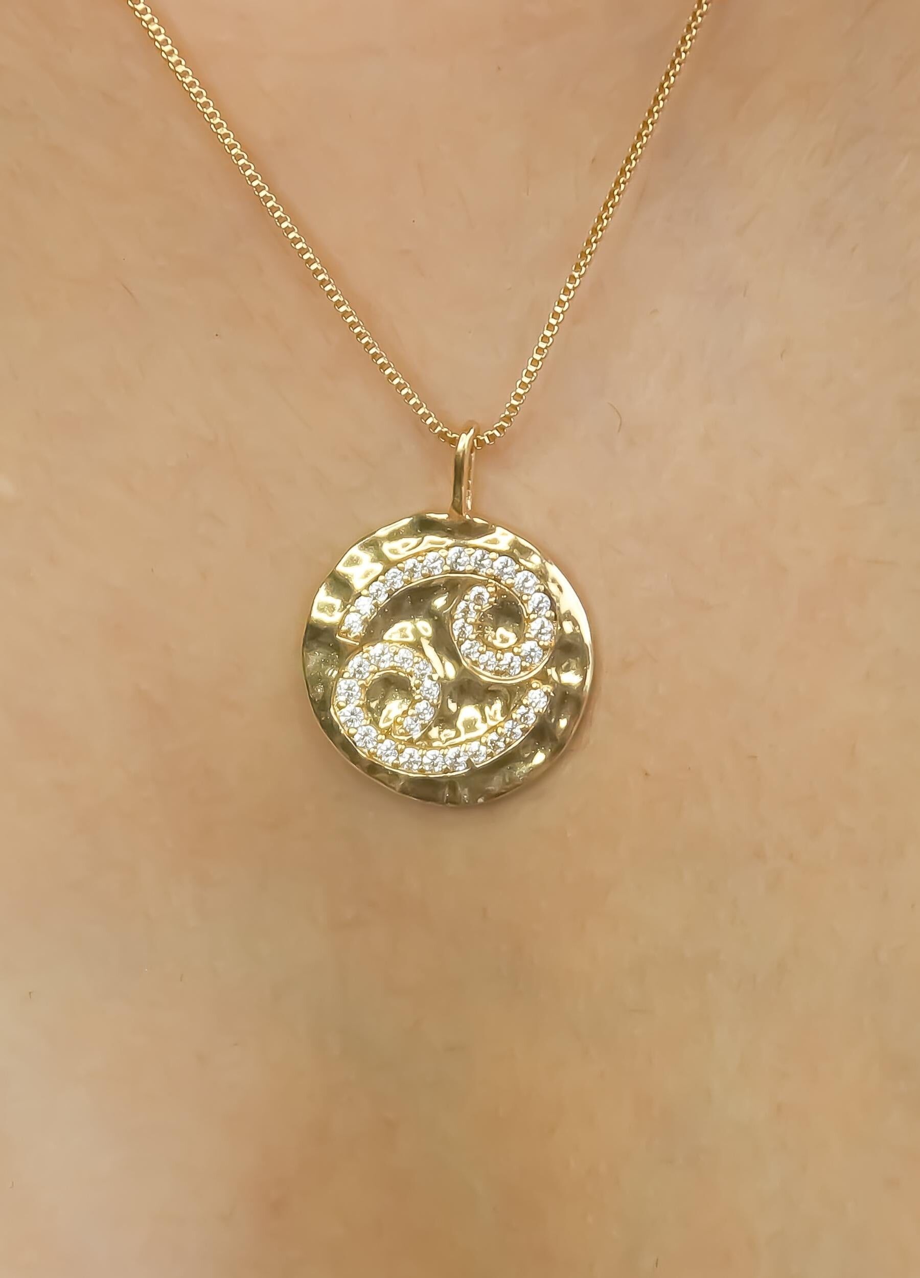 Colgante de moneda de cáncer estelar