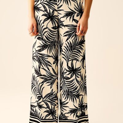 Pantaloni a gamba larga in bianco con dettaglio floreale in nero