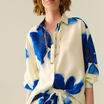 Chemise décontractée blanche à imprimé fleurs tropicales bleues