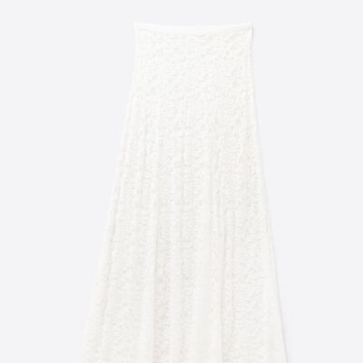 Jupe longue en dentelle blanche à motif floral