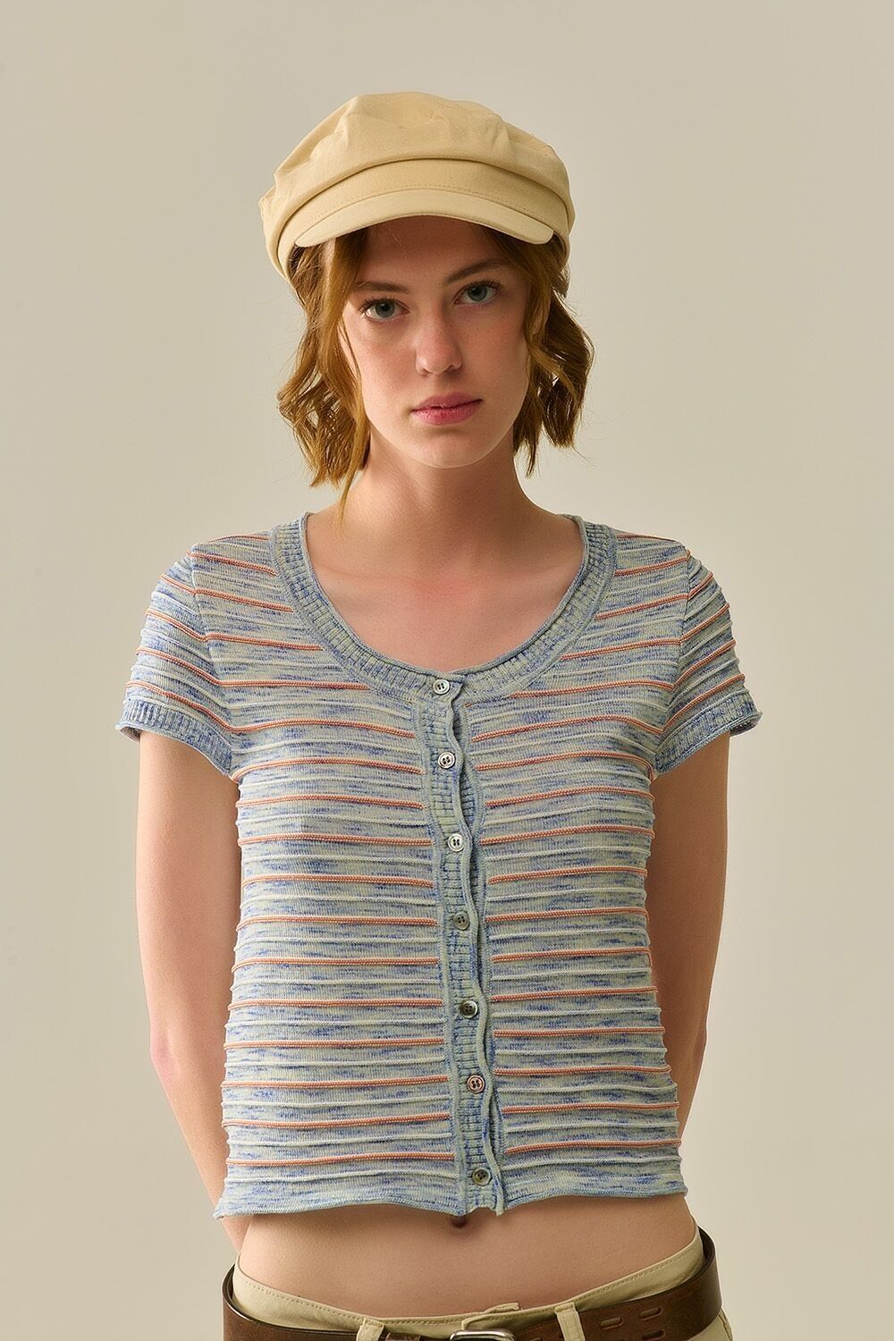 Maglione abbottonato in blu con strisce arancioni