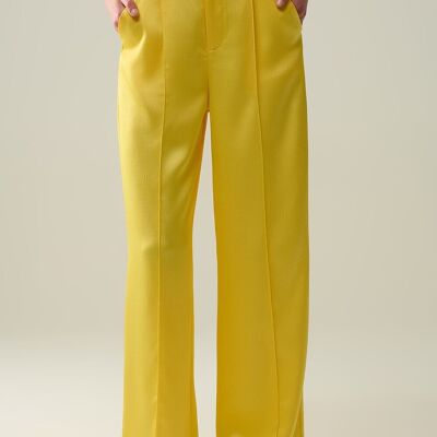 Pantalones anchos amarillos de satén texturizado