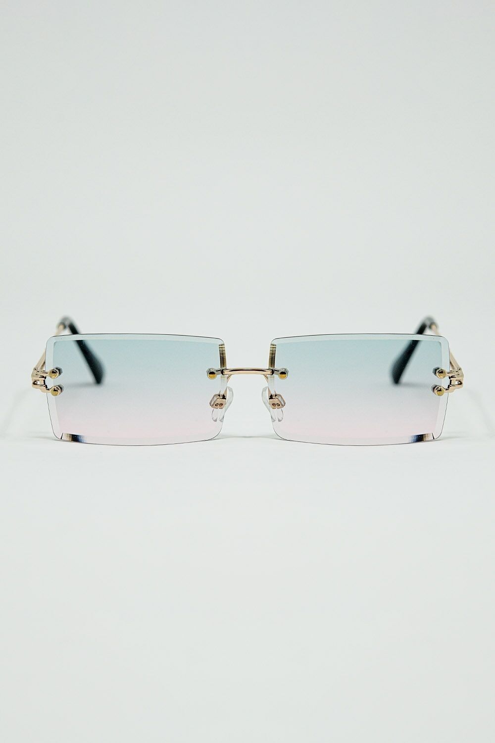 Schmale, randlose, quadratische Sonnenbrille in Gold mit türkis-rosa Verlaufsgläsern