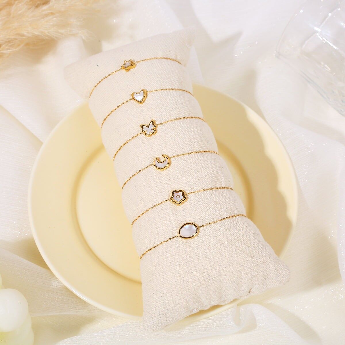 Set di 6 bracciali a catena in madreperla dorata