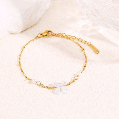 Bracciale a catena in oro con perla e fiocco bianco