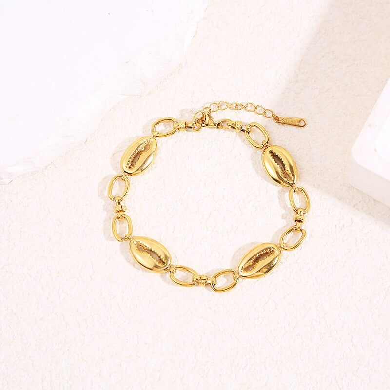 Goldkettenarmband mit 4 Goldmuscheln