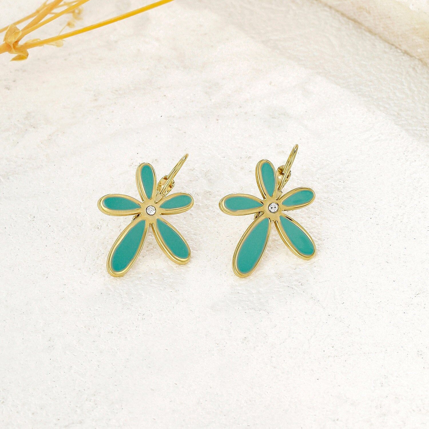 Orecchini a forma di margherita blu