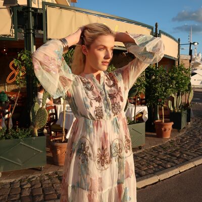 Long, flowing dress embroidered with sequins and rhinestones, with lining