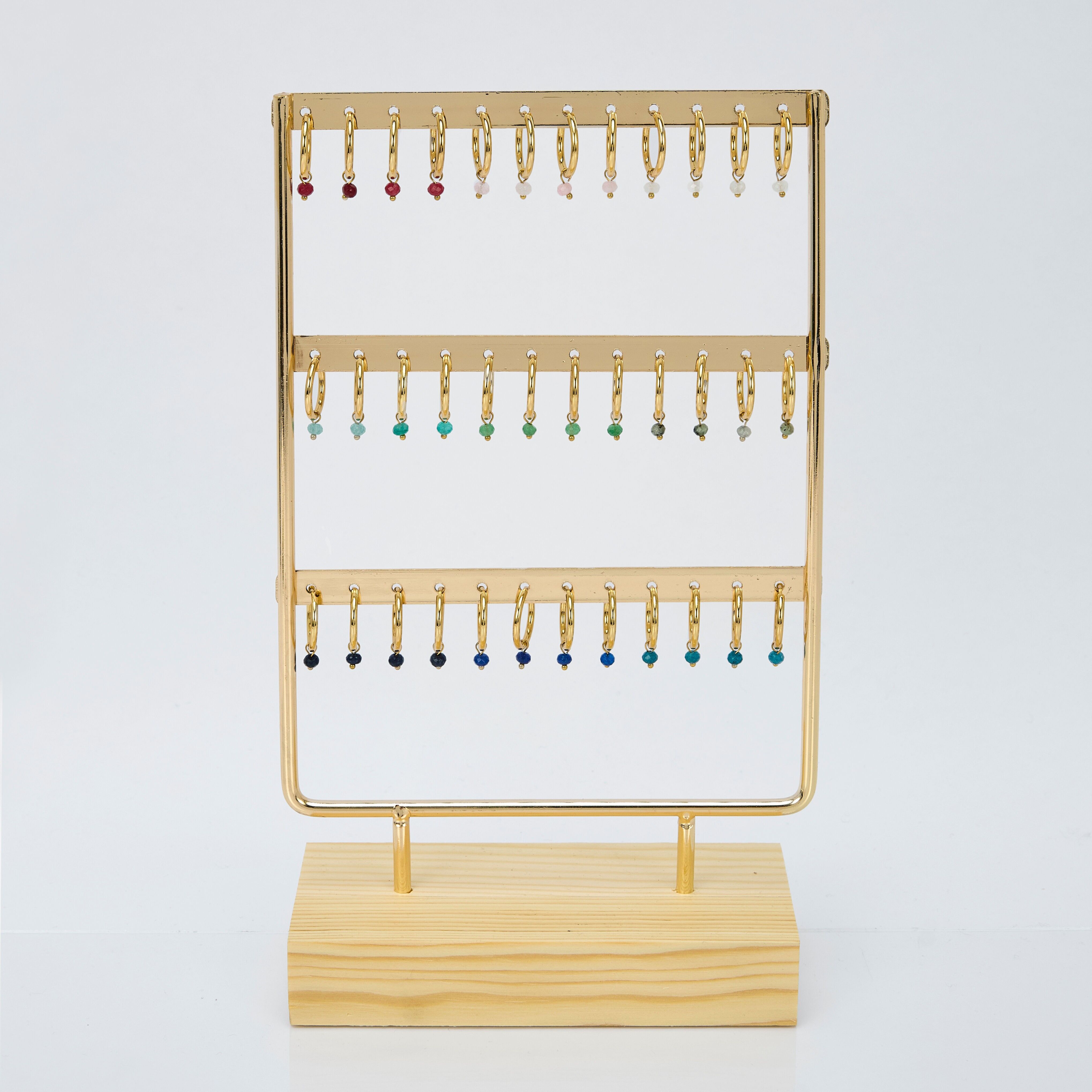 Creolen-Display aus Edelstahl mit Ellipsenperlen