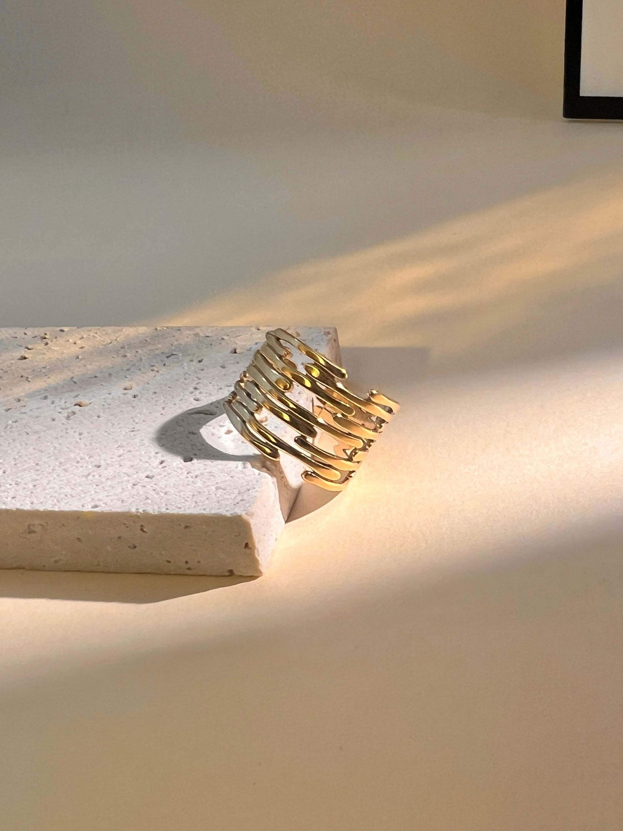 Modern and sculptural adjustable stainless steel ring