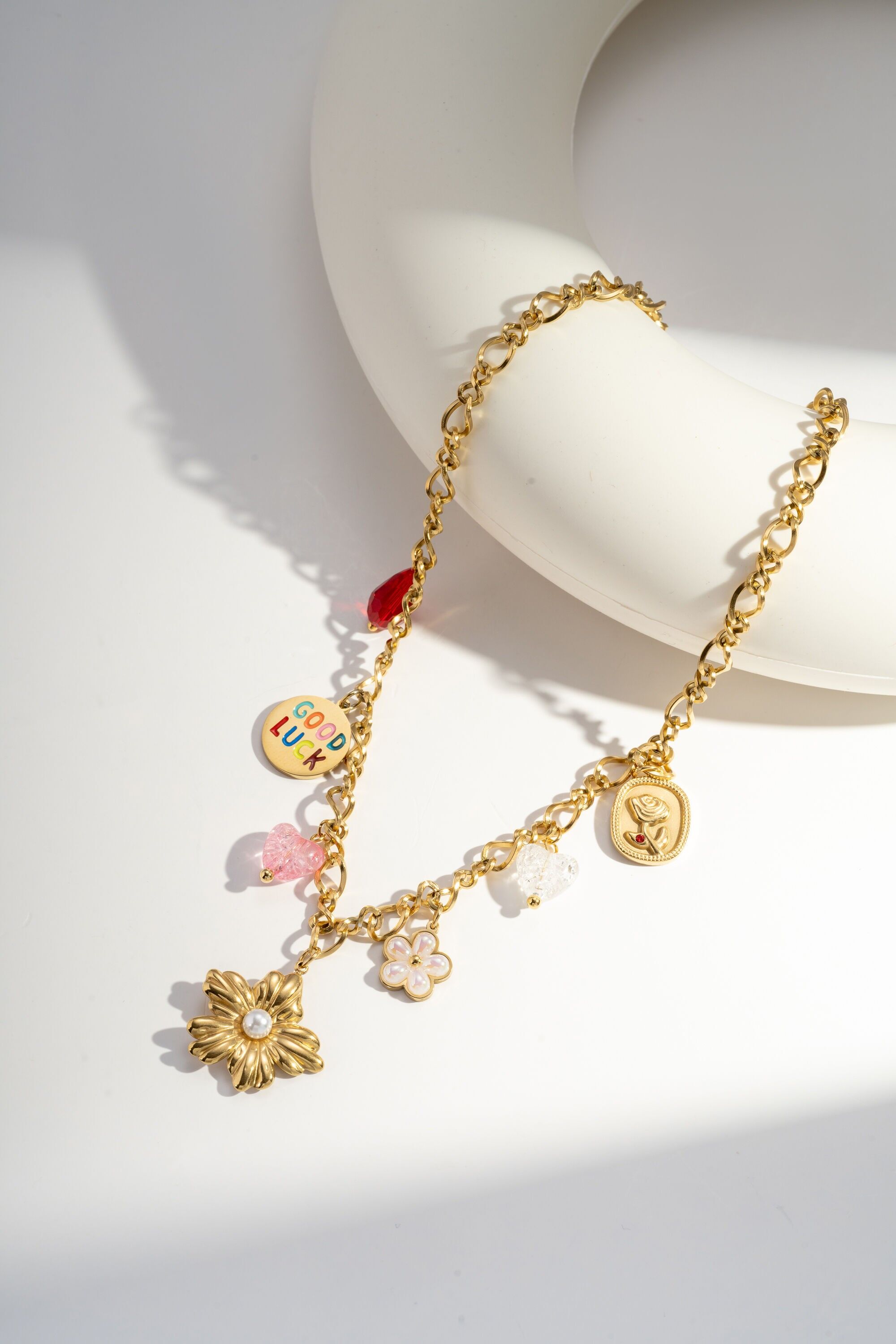 Steel pearl flower charm and pendant necklace