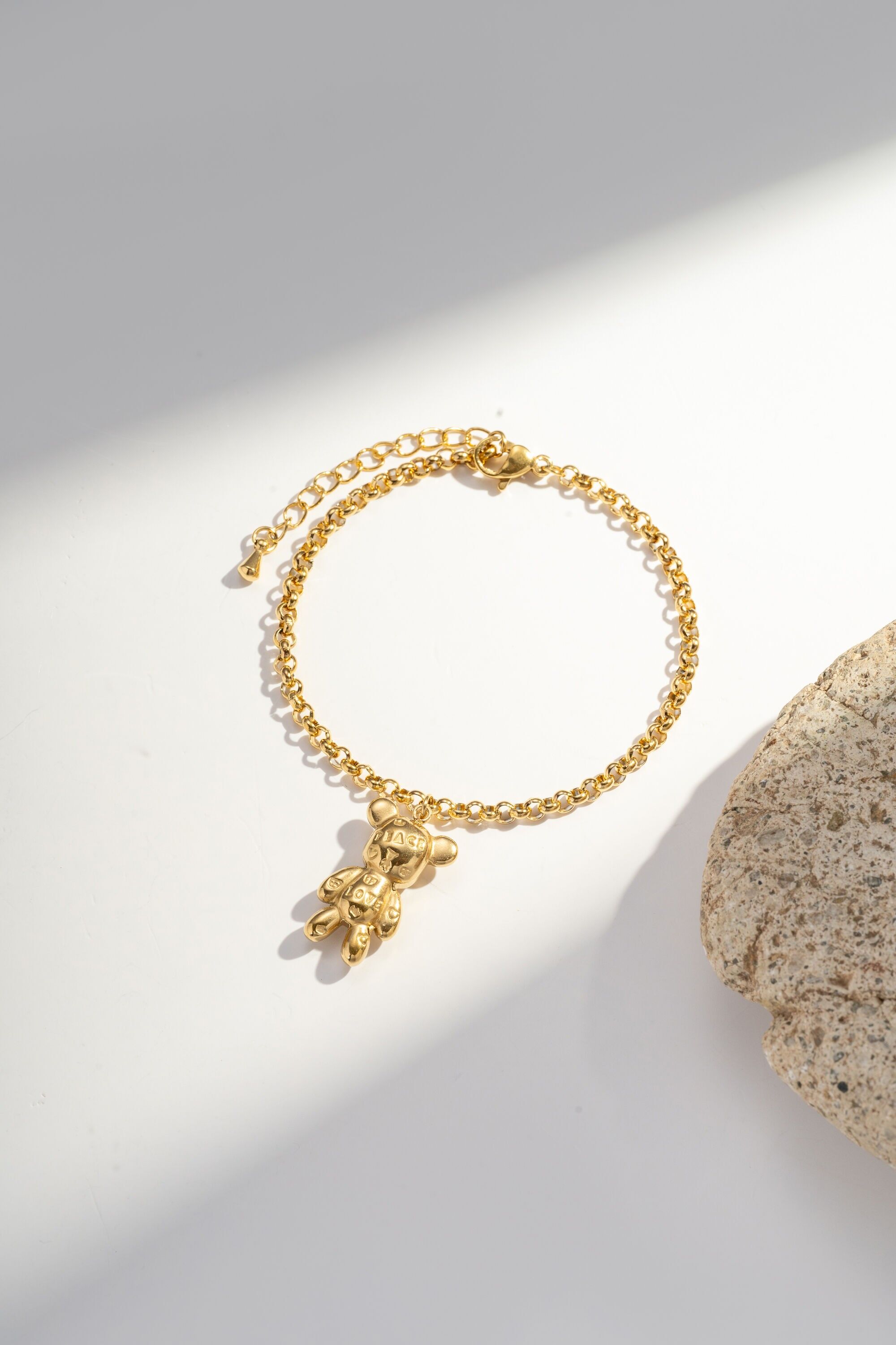 Stainless steel bracelet with golden teddy bear pendant