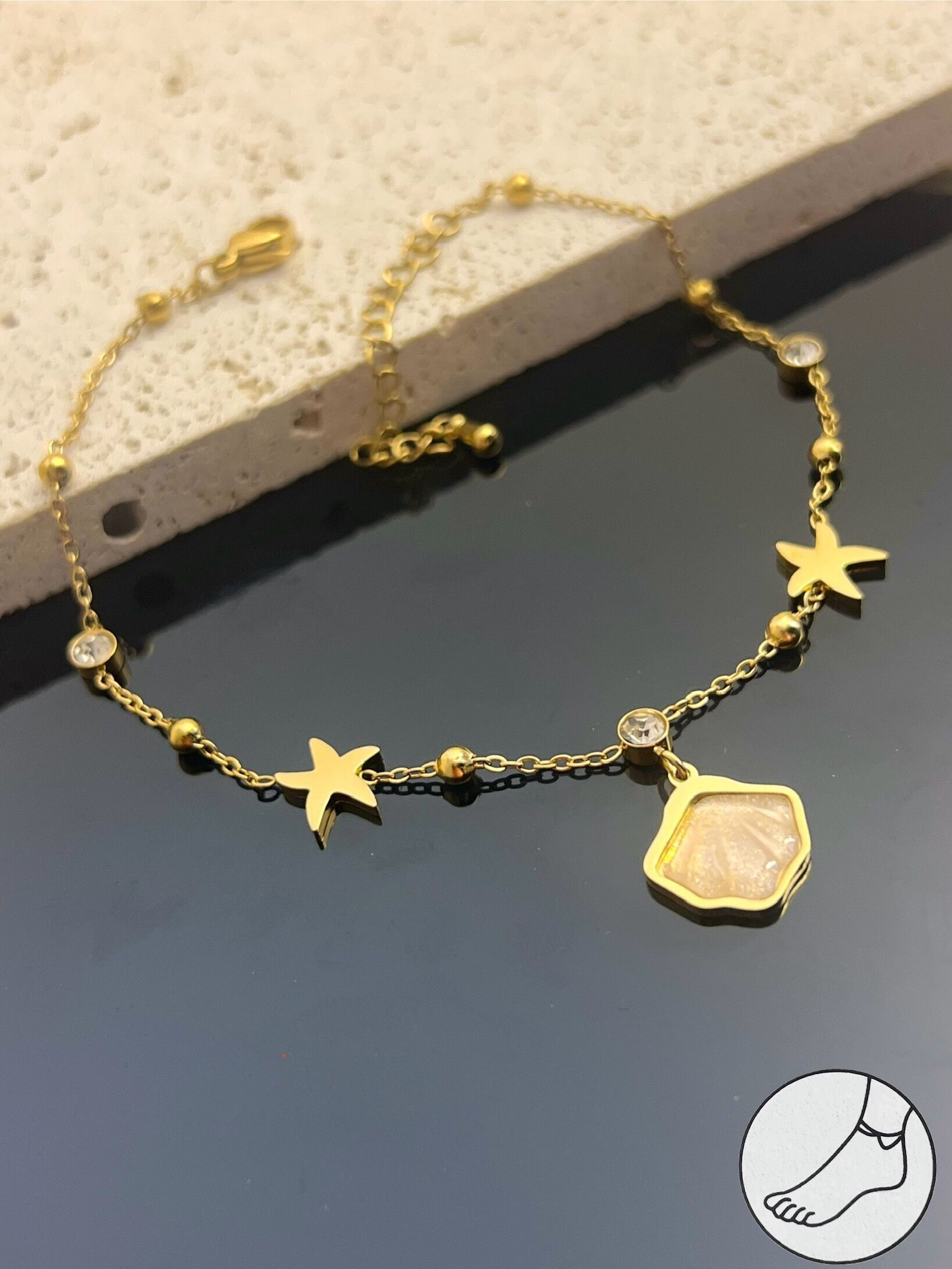 Tobillera de estrella y concha en acero inoxidable