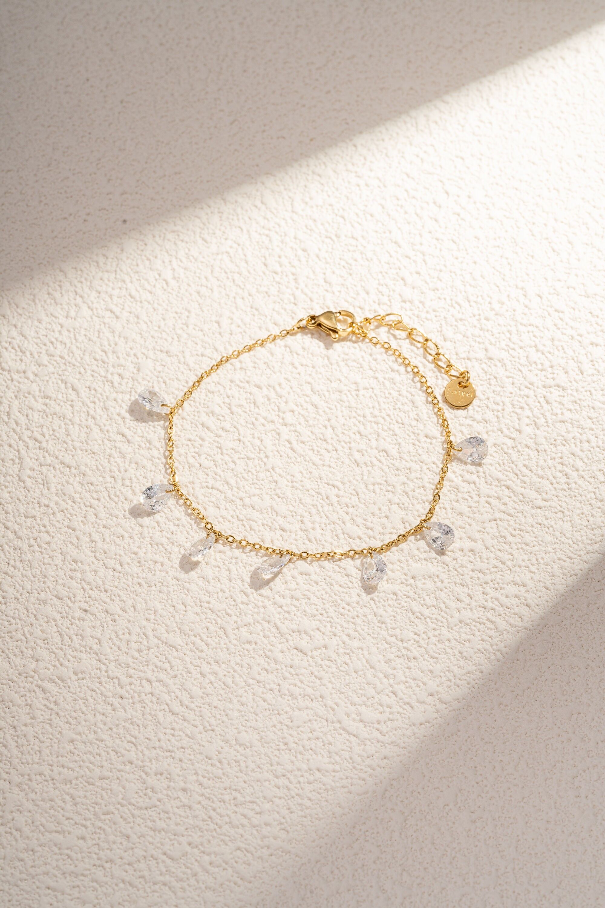 Pulsera con dije de cuentas de cristal