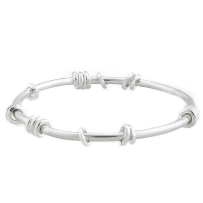 Pulsera de plata de ley hecha a mano con anillos fijos y móviles.