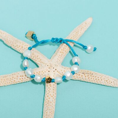 Pulseras de flores azules del océano